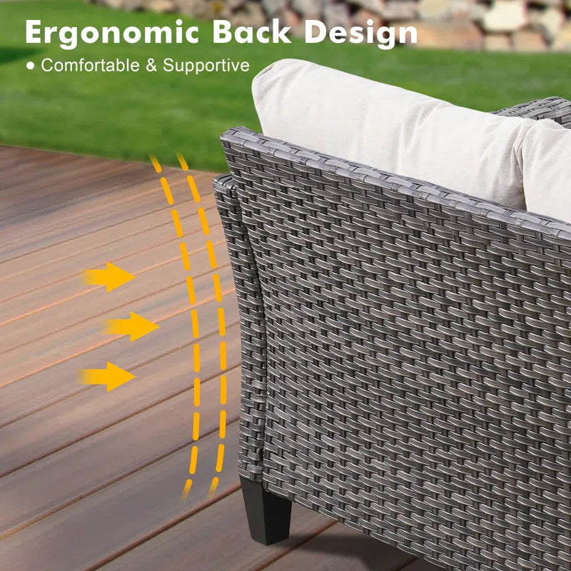 Lovall Rattan Wicker 7 - Person Seating Group with Fire Pit and Cushions